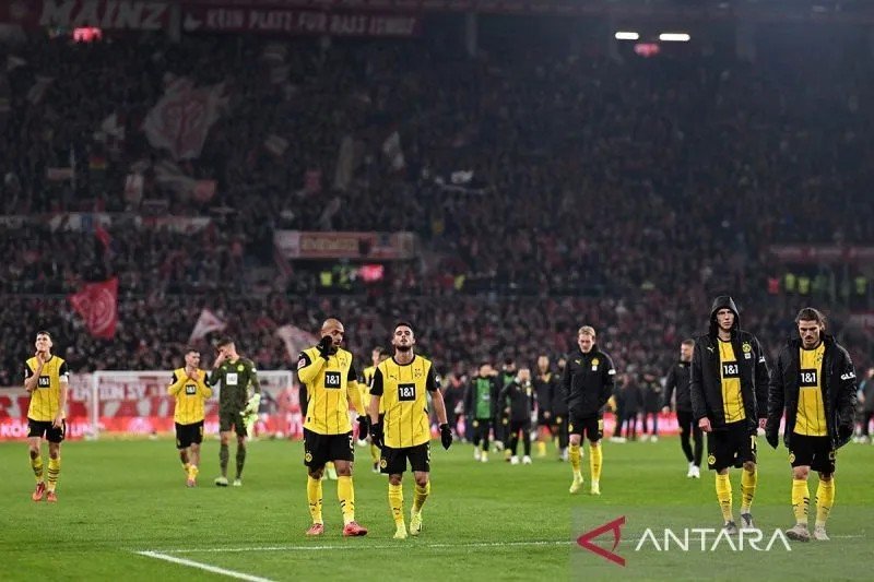 Reaksi para pemain Borussia Dortmund.