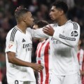 Duo pemain Real Madrid Jude Bellingham (kanan) dan Kylian Mbappe. Foto: AFP